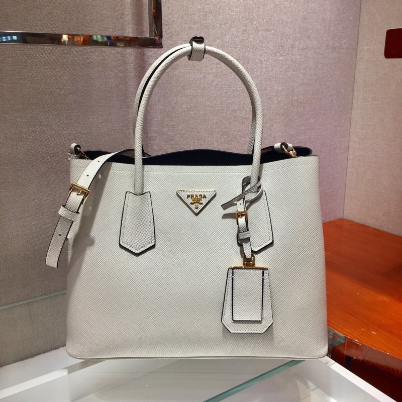 Pra*a top handle bags